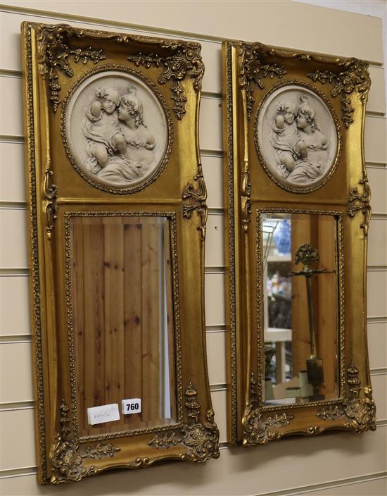 A pair of gilt mirrors with resin plaques W.31cm